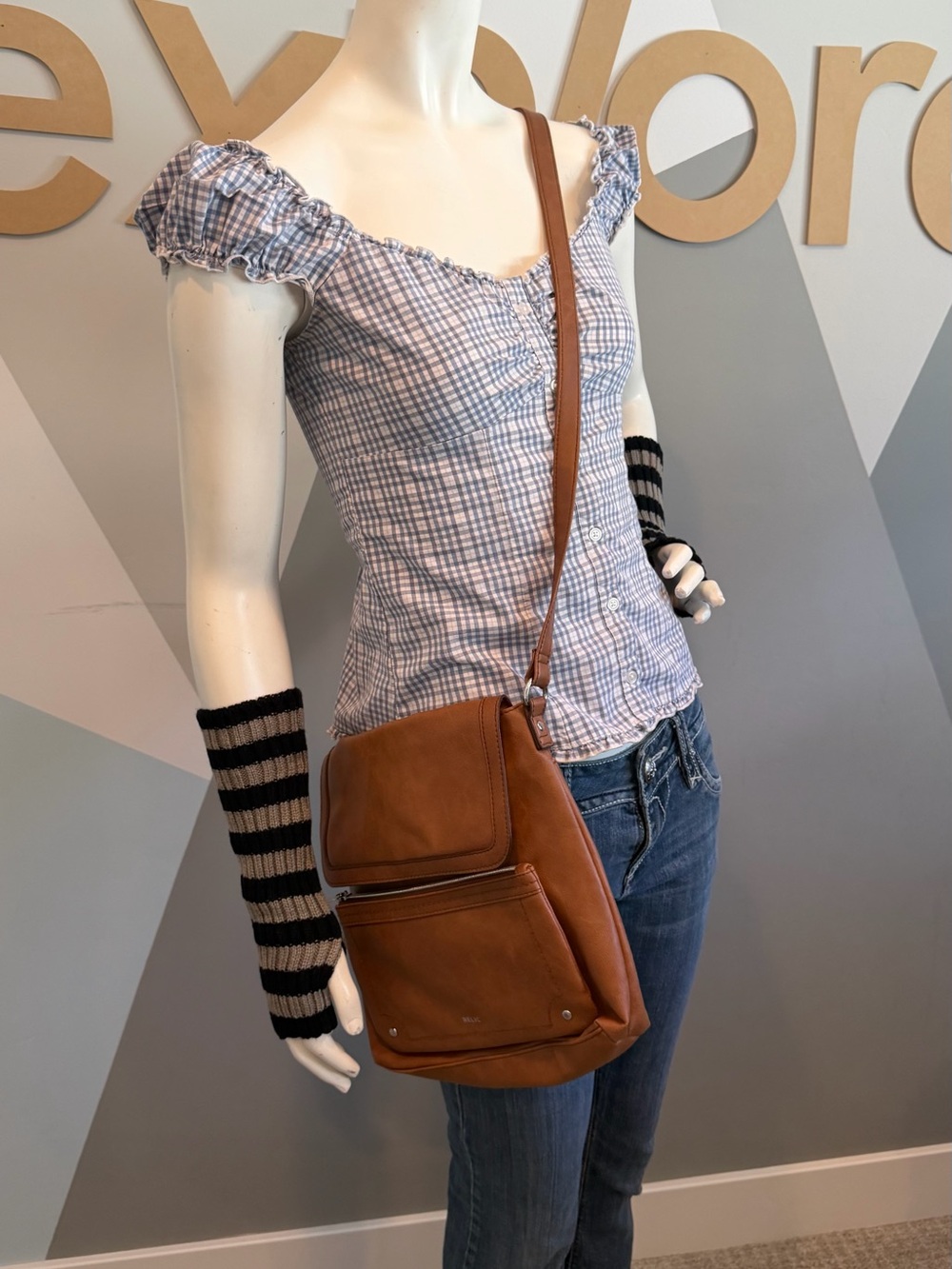 Fossil’s Relic Brown Crossbody Bag with Front Zip Pocket